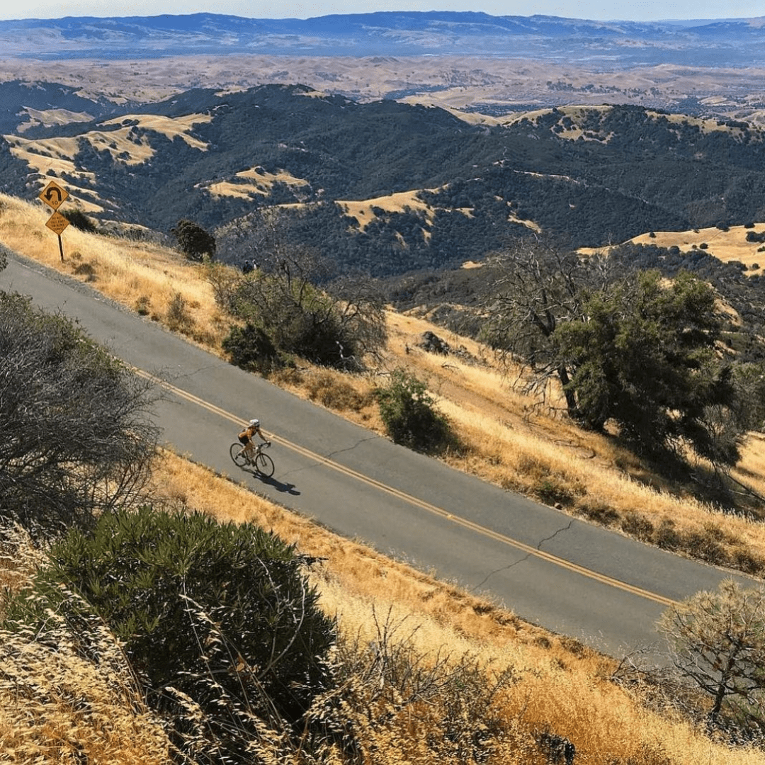 A cyclist bikes down Mt. Diablo State Park roads