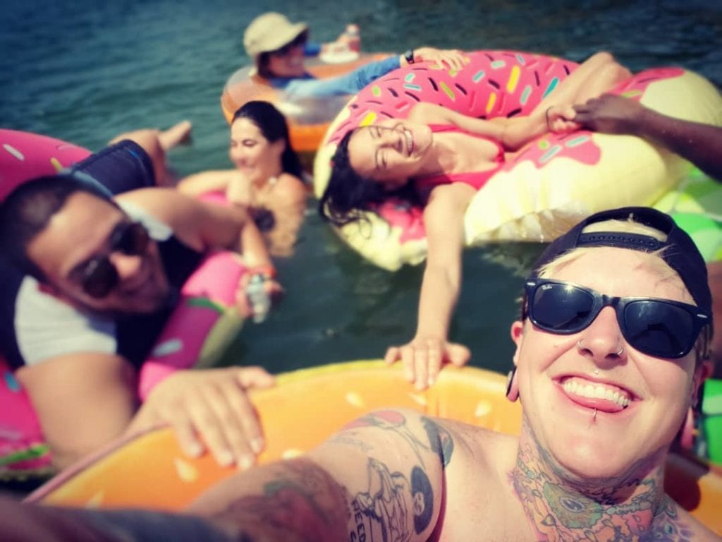 friends in floaties at lake del valle